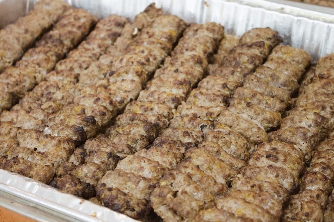 Catering tray filled with luleh kabob